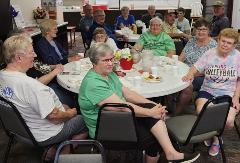 Reuniting with colleagues and acquaintances at Sterling Senior Center