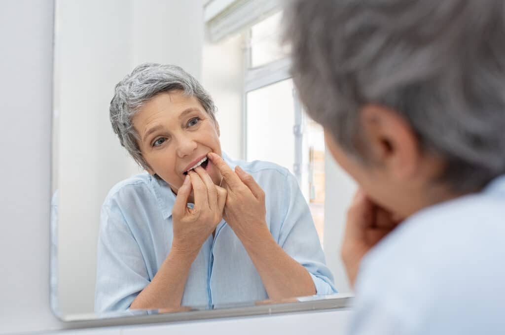 Personal care at home can help aging seniors maintain good oral hygiene.
